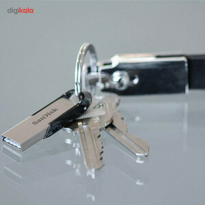 فلش مموری سن دیسک Ultra Flair CZ73 ظرفیت 64 گیگابایت با رابط USB 3.0 و بدنه فلزی مقاوم، سرعت انتقال 150 مگابایت بر ثانیه و سازگار با انواع سیستم‌عامل‌ها و دستگاه‌ها