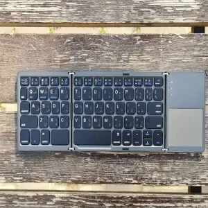 کیبورد وماوس بیسیم  Foldable keyboard with touchpad در بروزکالا