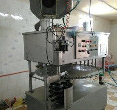 دستگاه پرکن دوغ بطری منو بلوک توان صنعت.jpg