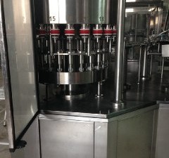 تری بلوک 24 نازل کوشش کاران پرکن بطری دوغ.jpg
