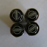 4x-nissan-chrome-metal-car-tyre-tire.jpg