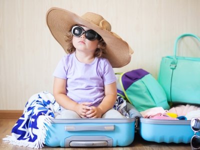 چمدان کودک یک وسیله ضروری برای سفر با کودک