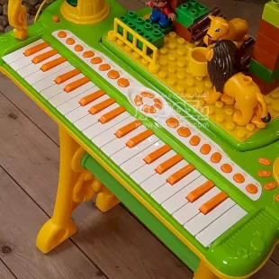 قیمت پیانو اسباب بازی سبز با میز بازی و میکروفون