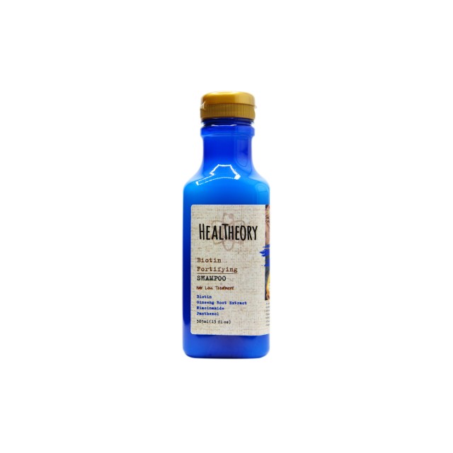 شامپو تقویت‌کننده و ضدریزش موی هلس تئوری (حاوی Biotin)