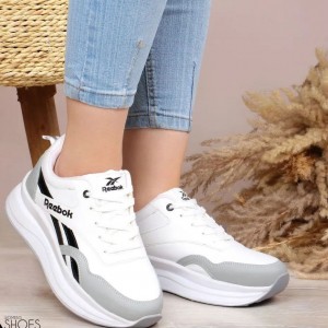 فروش ویژه کفش کتونی  دخترانه و زنانه مدل ریبوک رنگ سفید مشکی زیره پیو راحت و زیبا با ارسال رایگان