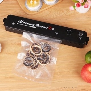 دستگاه وکیوم مواد غذایی خانگی به همراه کیسه  vacuum sealer