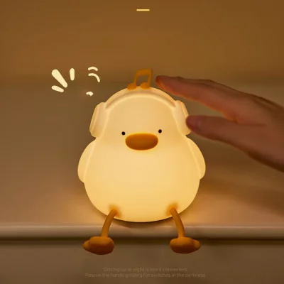 چراغ خواب فانتزی سیلیکونی رومیزی شارژی طرح اردک موزیکال Musical Duck