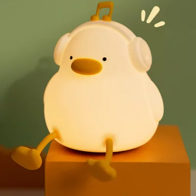 چراغ خواب فانتزی سیلیکونی رومیزی شارژی طرح اردک موزیکال Musical Duck