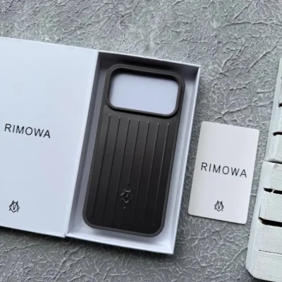 قاب آیفون 17 پرو طرح ریمووا با پک و کیفیت اورجینال مدل RIMOWA iPhone 17 Pro